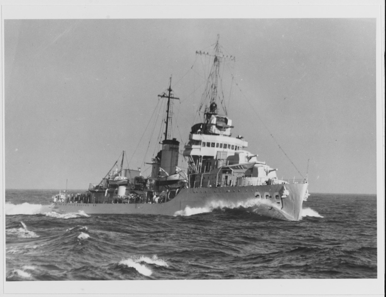 USS REID (DD-369) underway at high speed, at sea during the later 1930s