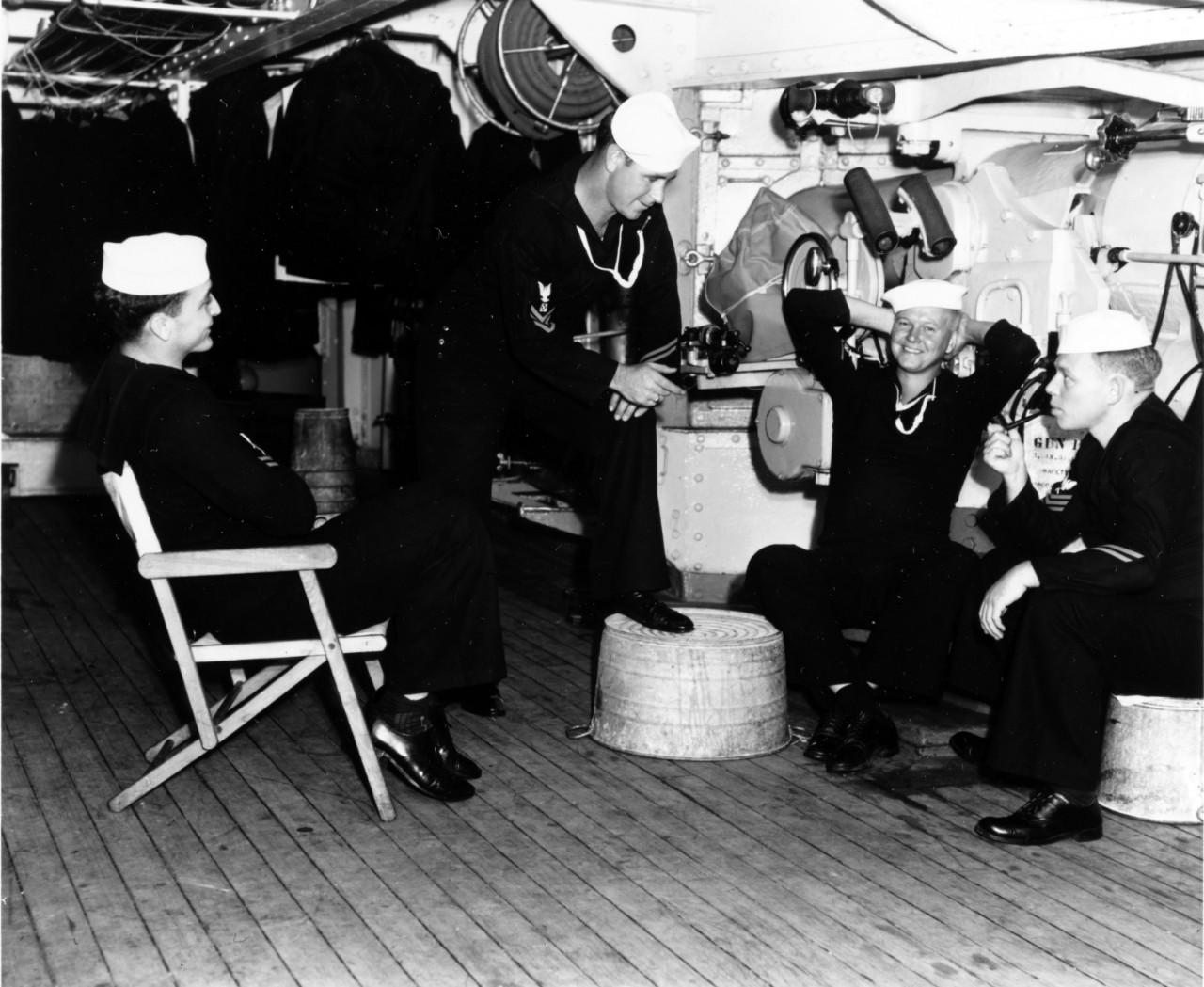 "Modern Salts". "Spinning a Yarn" in the casemate of 5"/51 gun number eleven of USS ARKANSAS (BB-33) on October 27, 1940