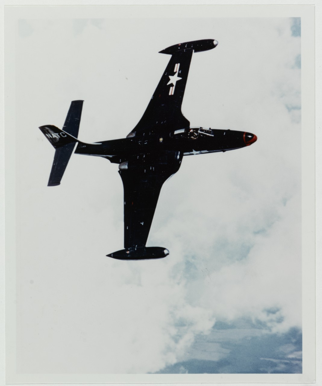 McDonnell F2H-2 "BANSHEE" in flight over Patuxent River, Maryland, circa 1950s