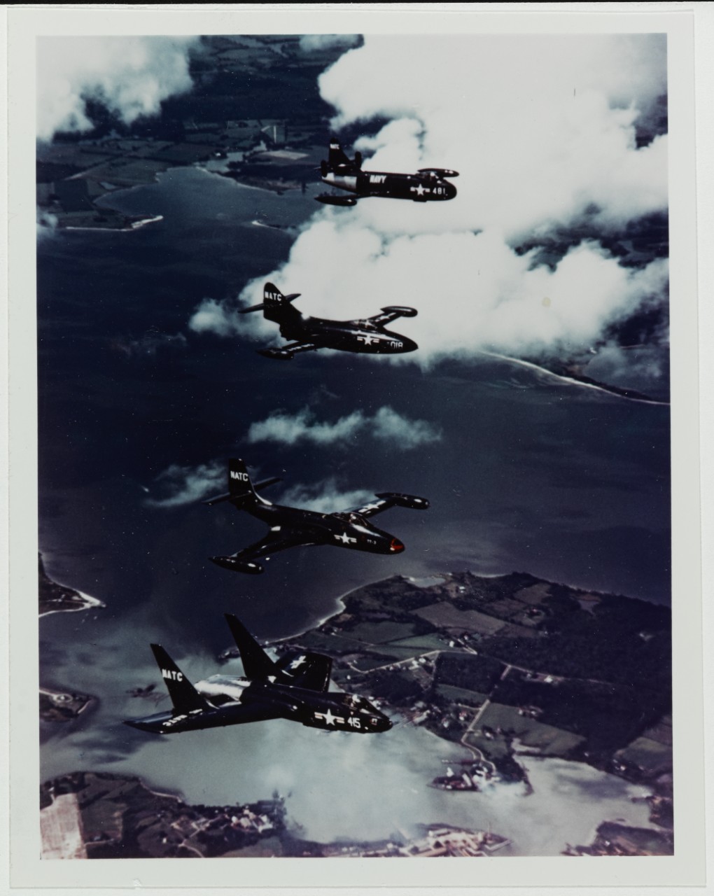 Vought F7U-1 Cutlass, McDonnell F2H-2 Banshee, Grumman F9F Panther, Vought F6U-1 Pirate flying in formation, circa 1950s