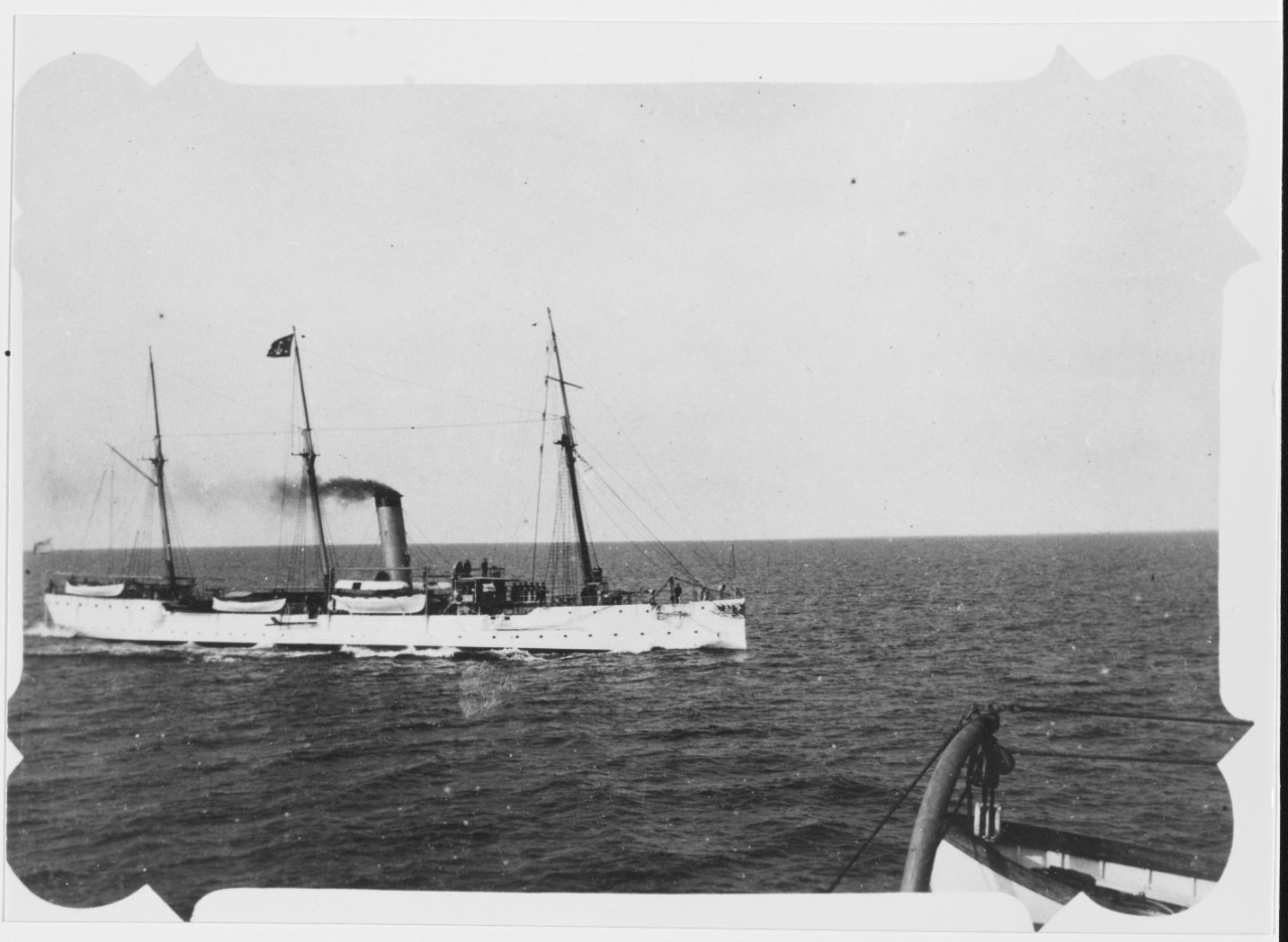 USS DOLPHIN (1885-1922) Steaming alongside USS MAINE (BB-10), with the Secretary of the Navy on board, circa 1903-1905.