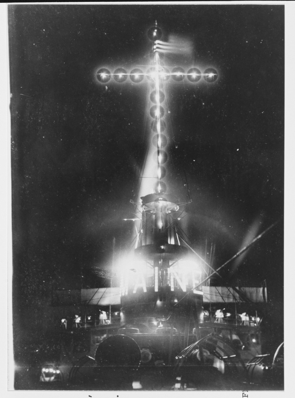 USS MAINE (BB-10) Illuminated for public display, at Watch Hill, Rhode Island, circa 1903-1905.