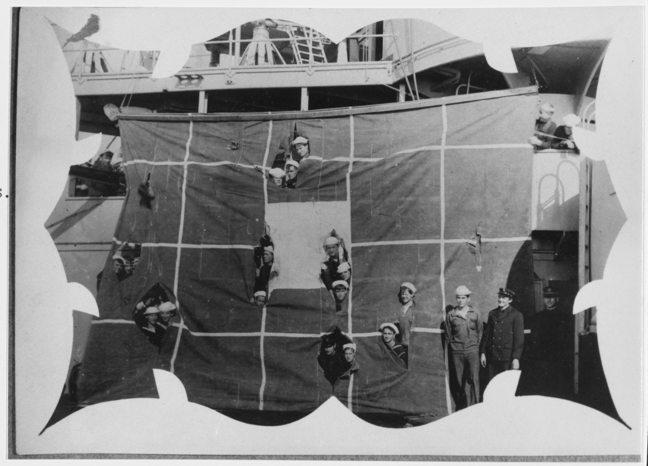 USS MAINE (BB-10) Gun crew poses with their target, after gunnery practice, circa 1903-1905.