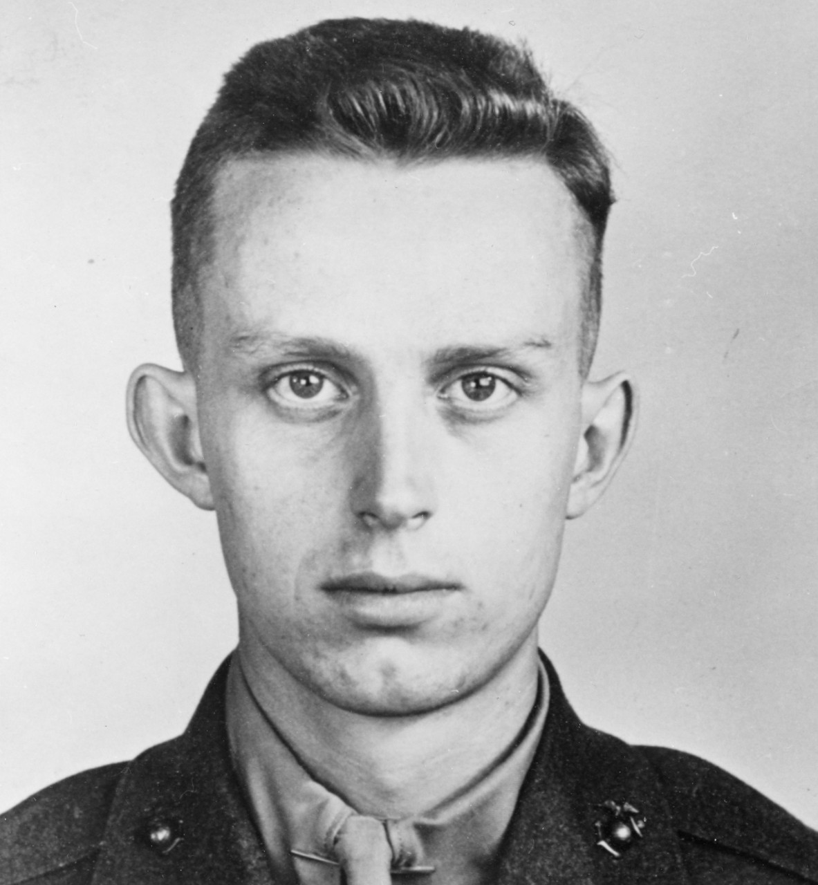 Private William G. Turner, USMC. view taken 16 January 1941. He was awarded a Bronze Star (posthumously) for supplying machine gun ammunition to the operator of a machine gun at Ewa Mooring Mast Field, during the Japanese attack on 7 December 1941.