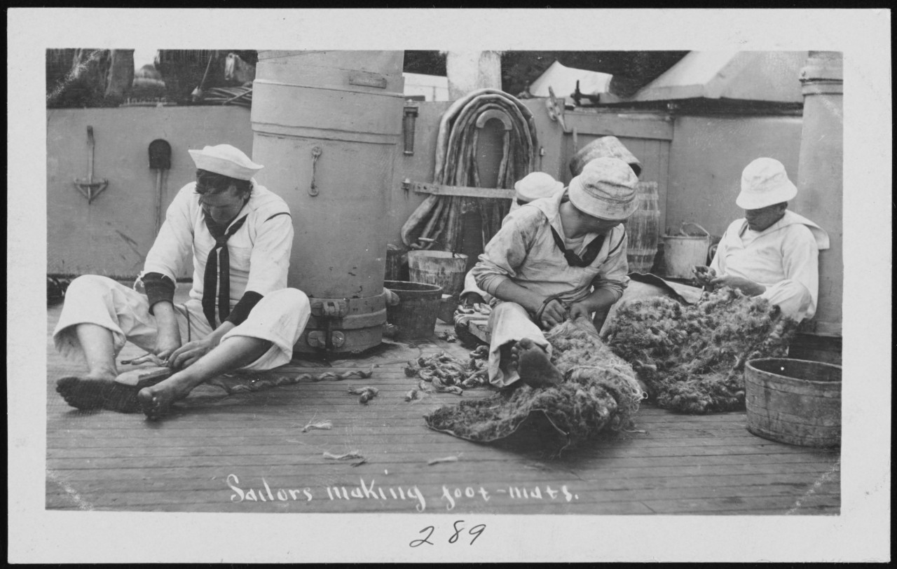 Photo #: NH 106073  &quot;Sailors making foot-mats&quot;