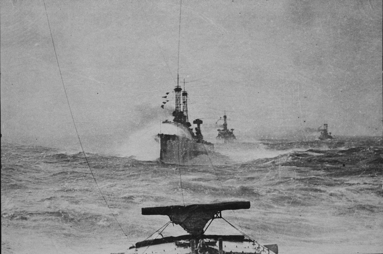 Battleships in North Sea weather.