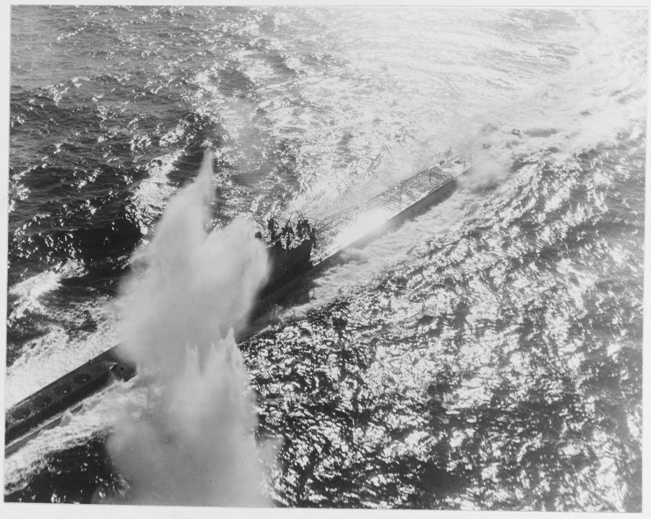 Fighting the foe from Salerno to Tarawa--Depth charge blasts Nazi sub