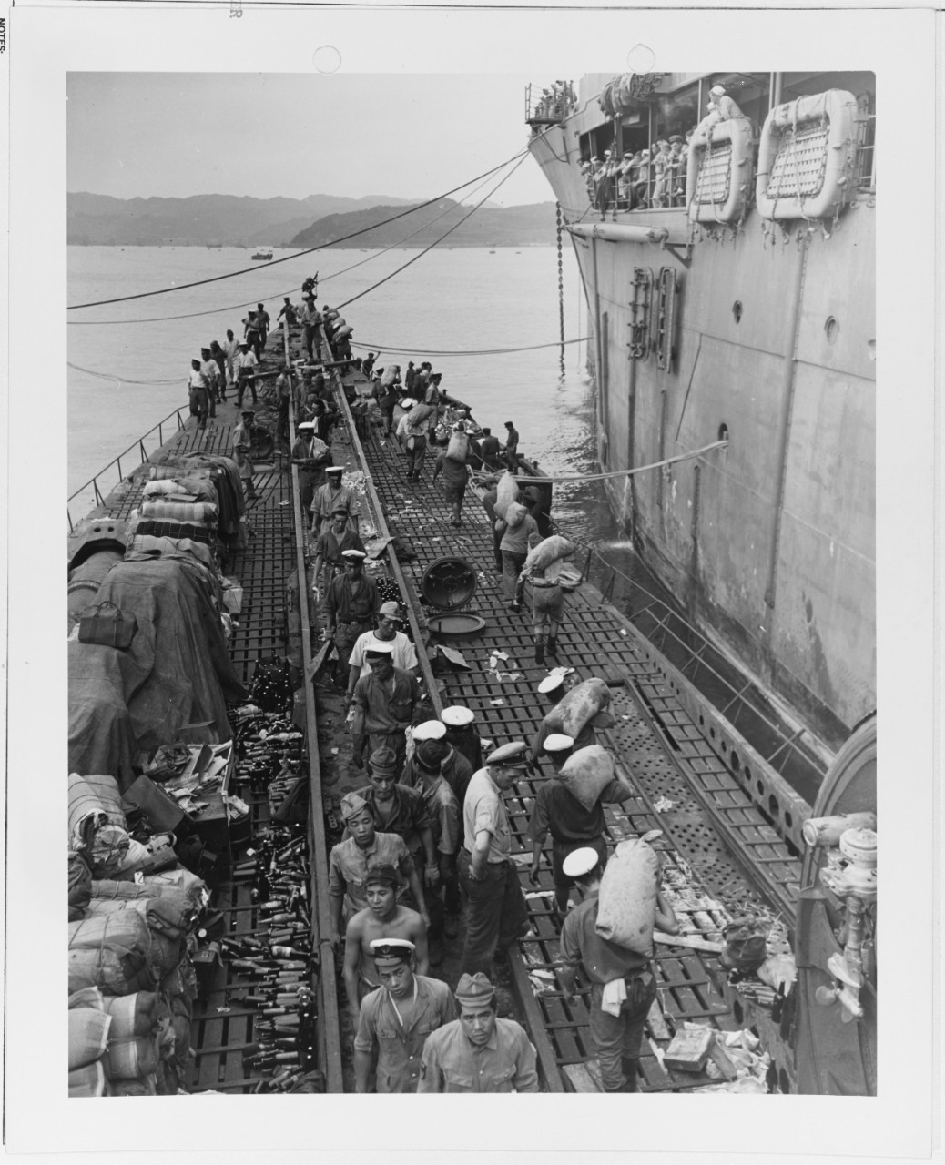 Japanese Crew unloading cargo off the I-400 Japanese Submarine