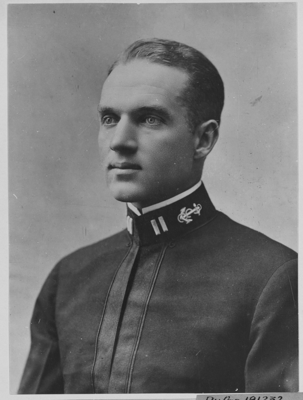 Commander John H Towers.
