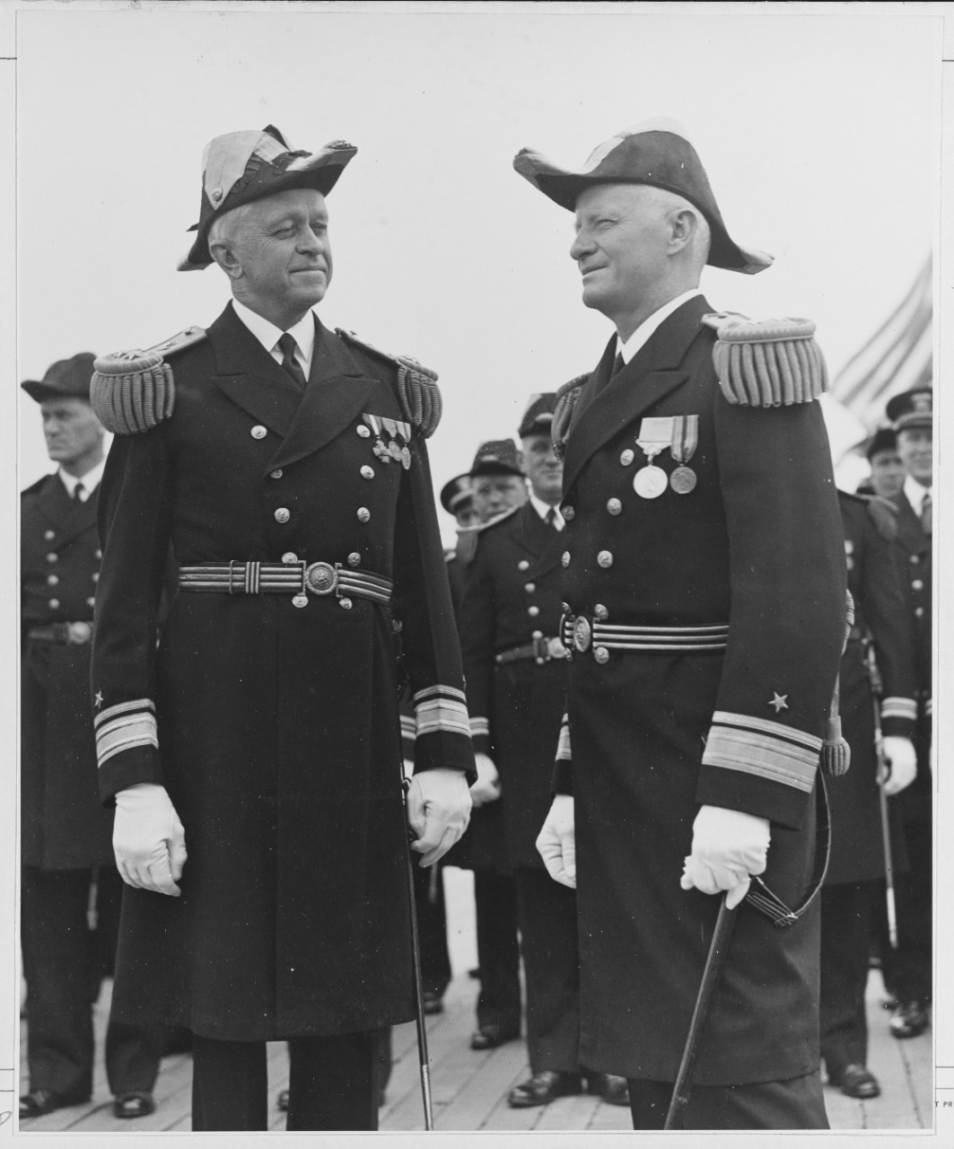 Rear Admiral Russell Wilson, USN Rear Admiral Chester W. Nimitz, USN.