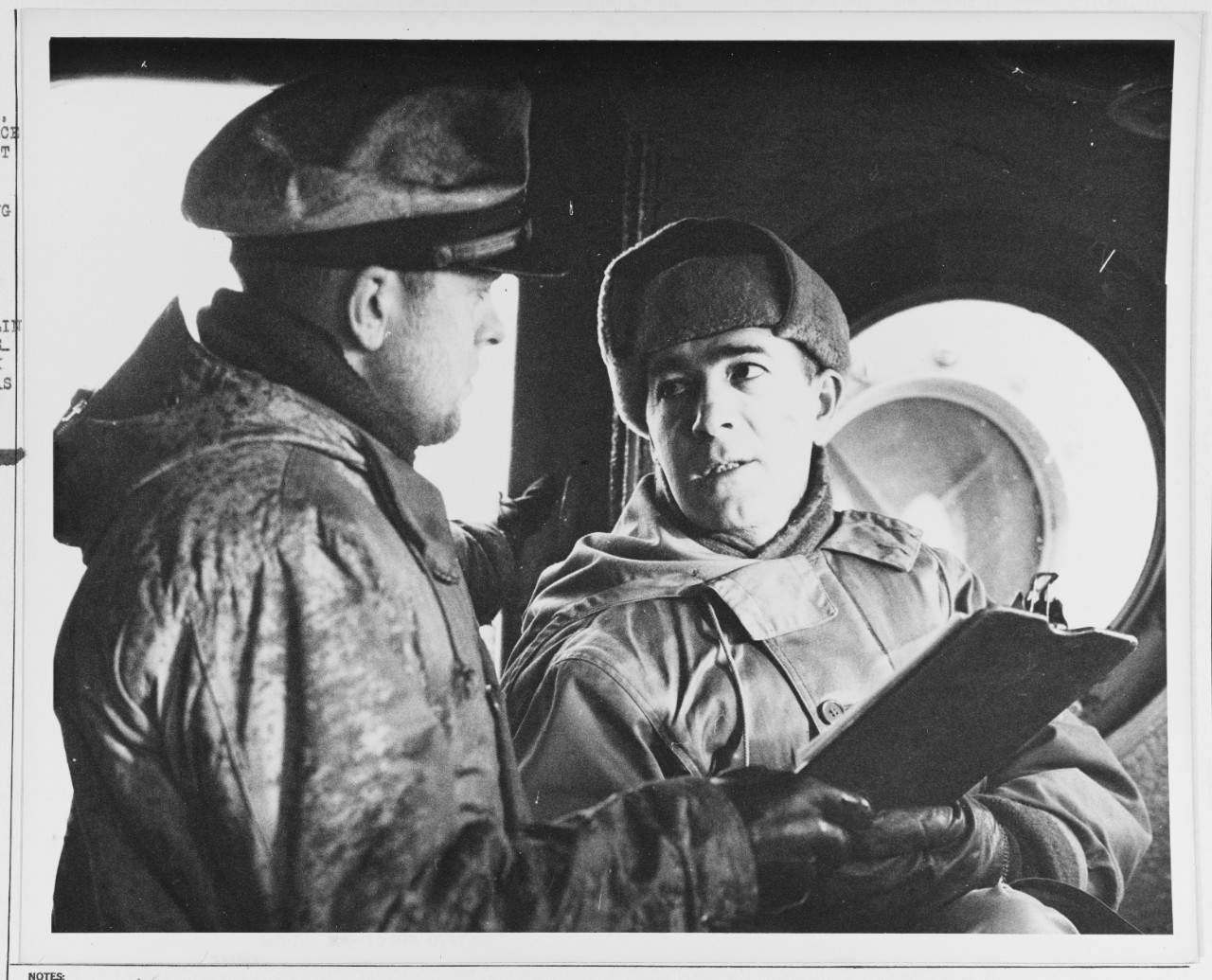 CDR. James A. Hirshfield, USCG, and his signal officer Ensign Barring Coughlin