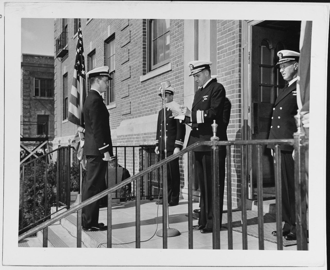 Ensign Richard L. Stewart, USN, and Rear admiral F.A. Daubin, USN, Comsublant New London Conn.