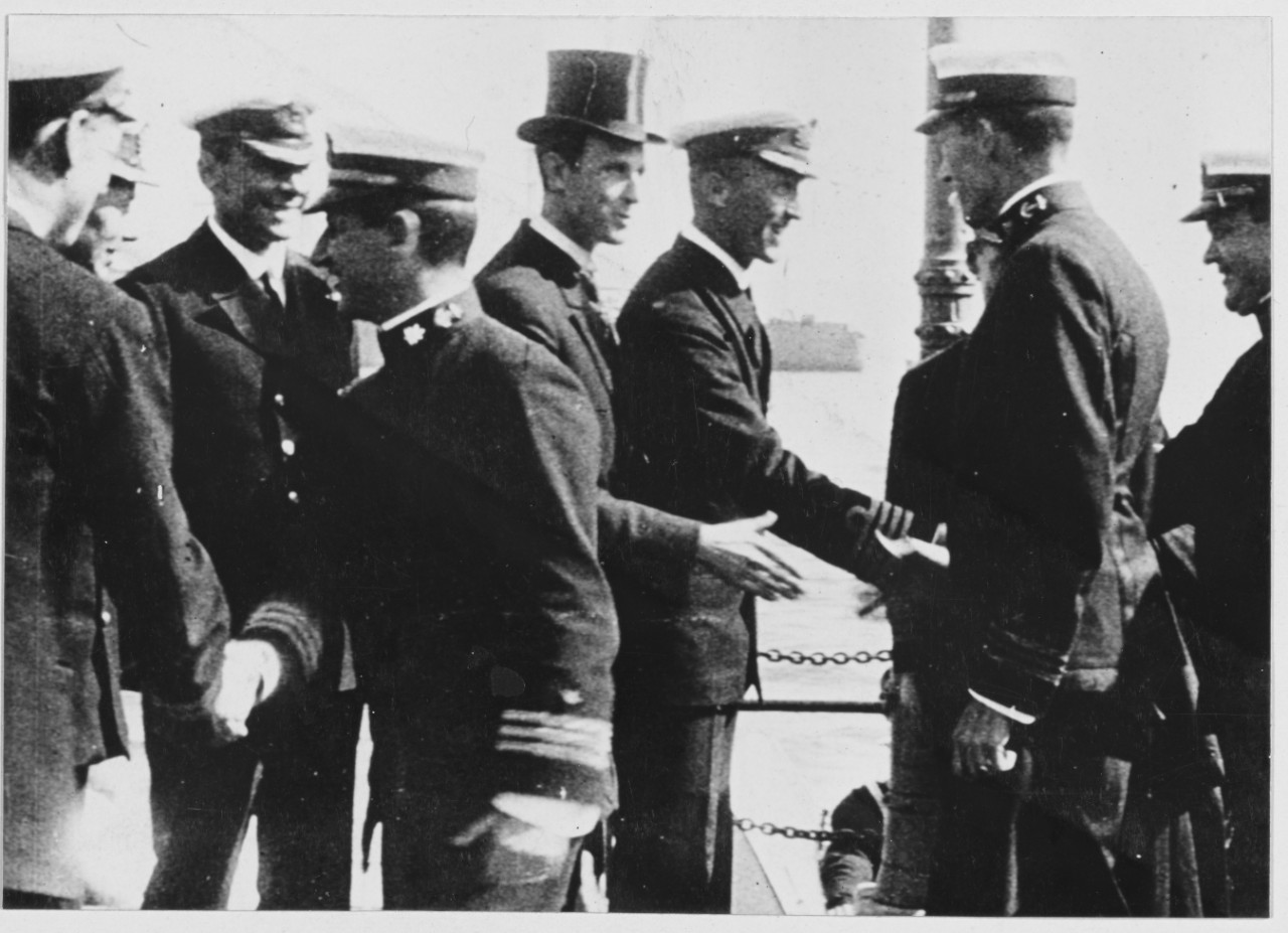 Mr. Wesley Frost, American consul, and British Naval officers greeting Commander Taussig, May 4, 1917