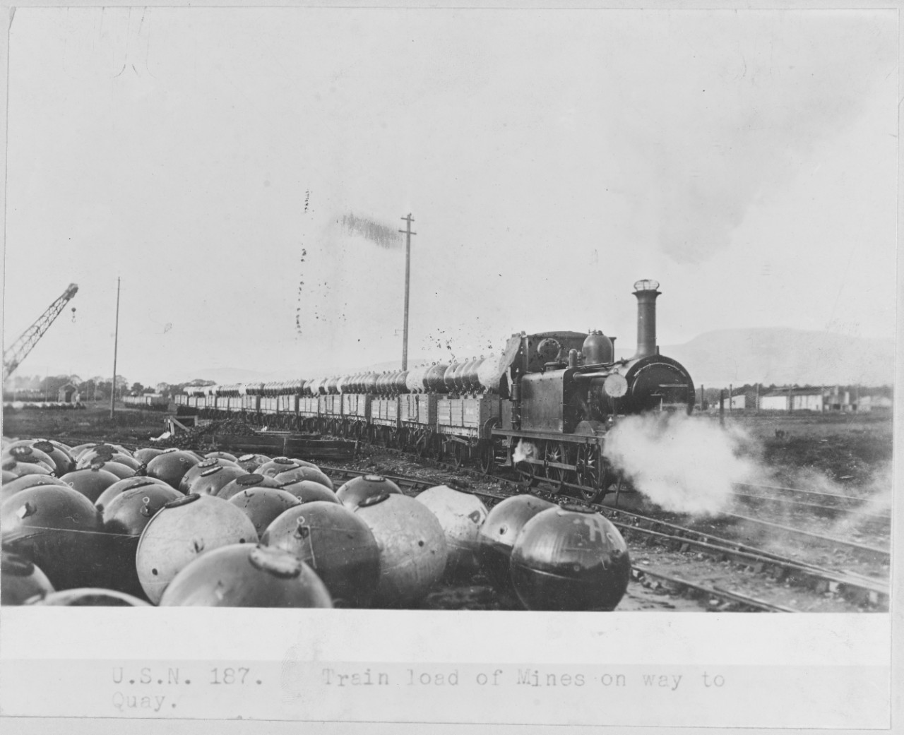 USN 187. Train load of Mines on way to Quay. 1918