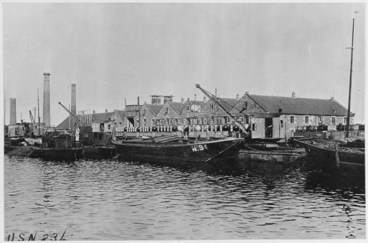 Loading mines in barges for transportation, Inverness, Scotland. September 1918