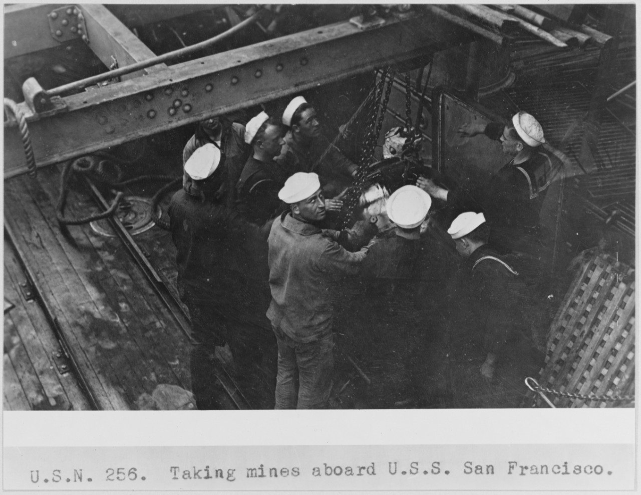 USN 256. Taking Mines aboard USS SAN FRANCISCO