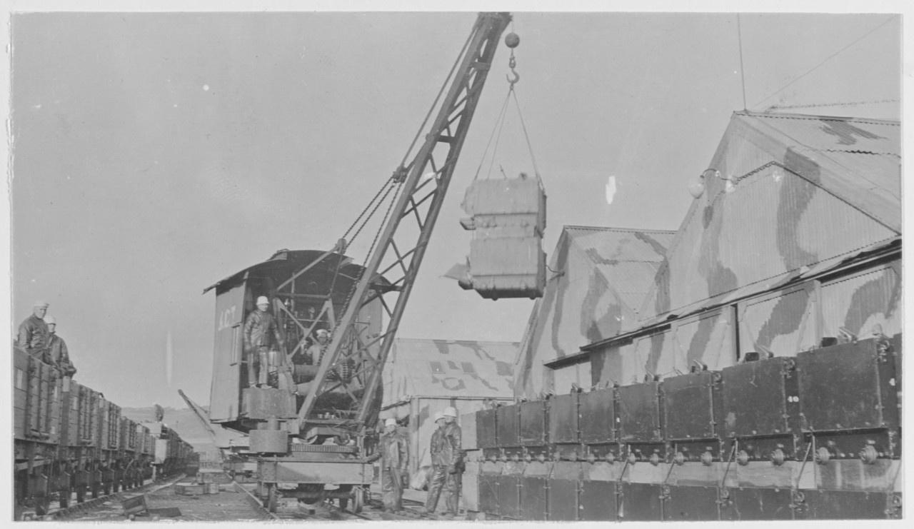 Unloading Mine sinkers at assembly sheds. Navy Yard Foreign Base 18. Inverness, Scotland