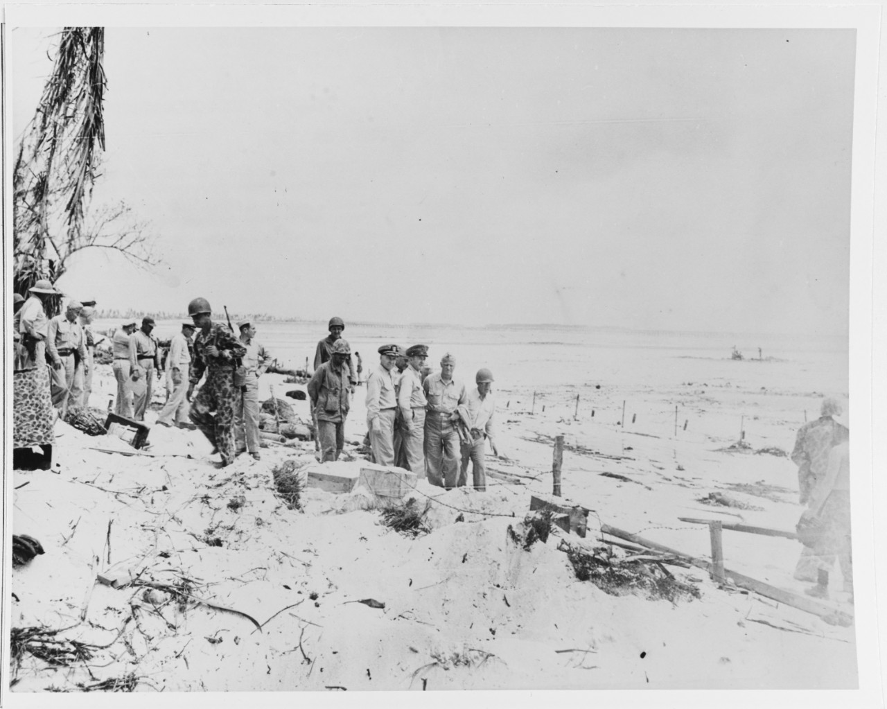 ADM C.W. Nimitz, Cincpac, and men inspect Betio Island, 27 Nov. 1943