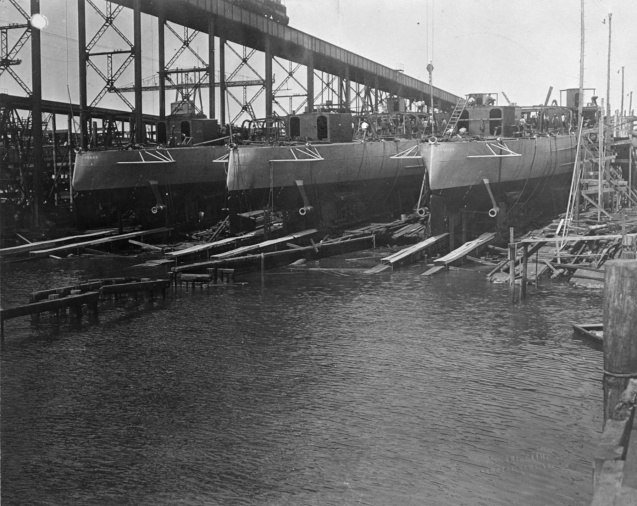 Three destroyers ready for launching on 4 July 1918 at Newport News Shipbuilding and Drydock Company; USS Haraden (DD-183), USS Abbot (DD-184), and USS Thomas (DD-182). Photo by E.P. Griffith of Newport News.