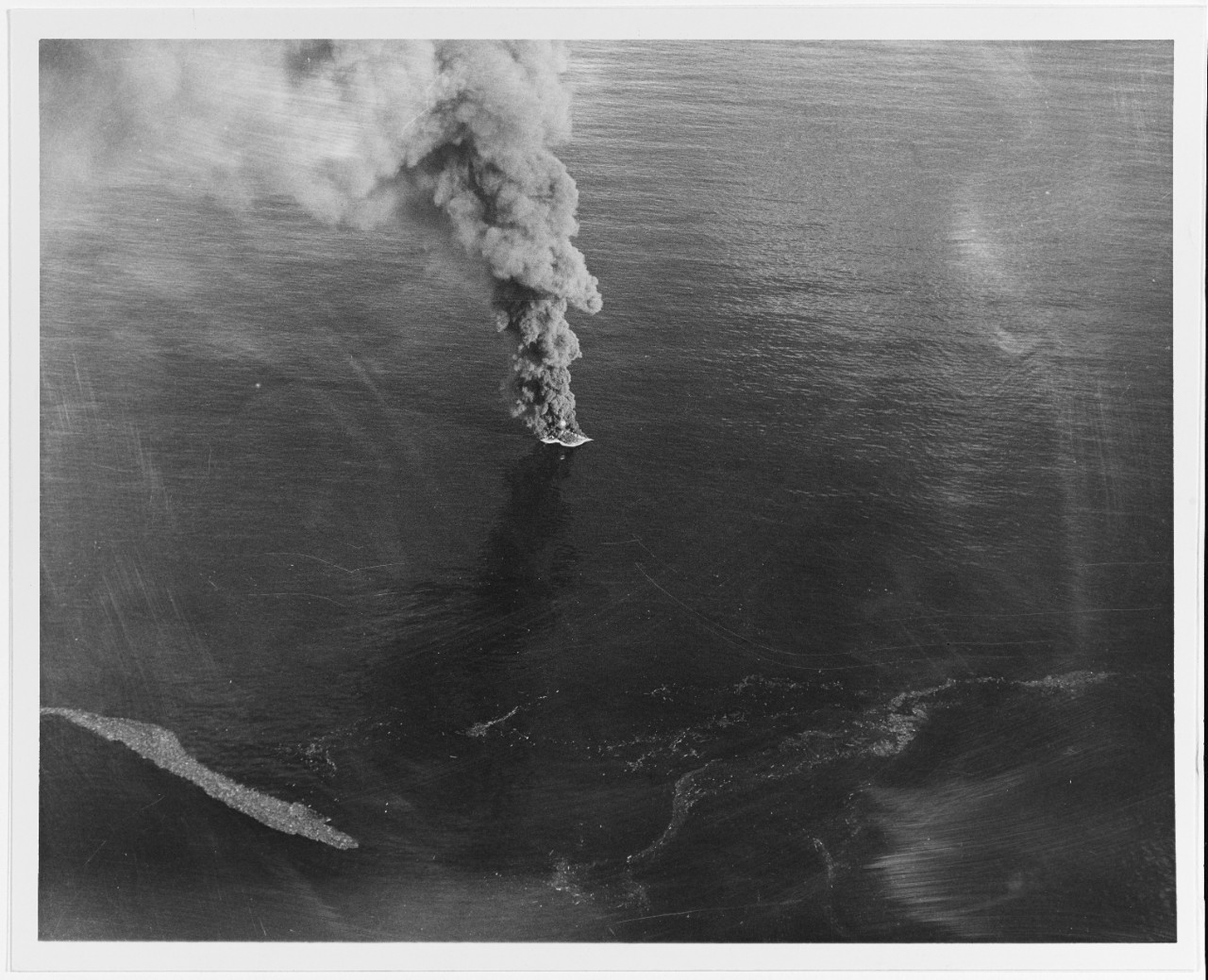 USS DENVER (CL-58) sinking enemy warship, 25 October 1944.