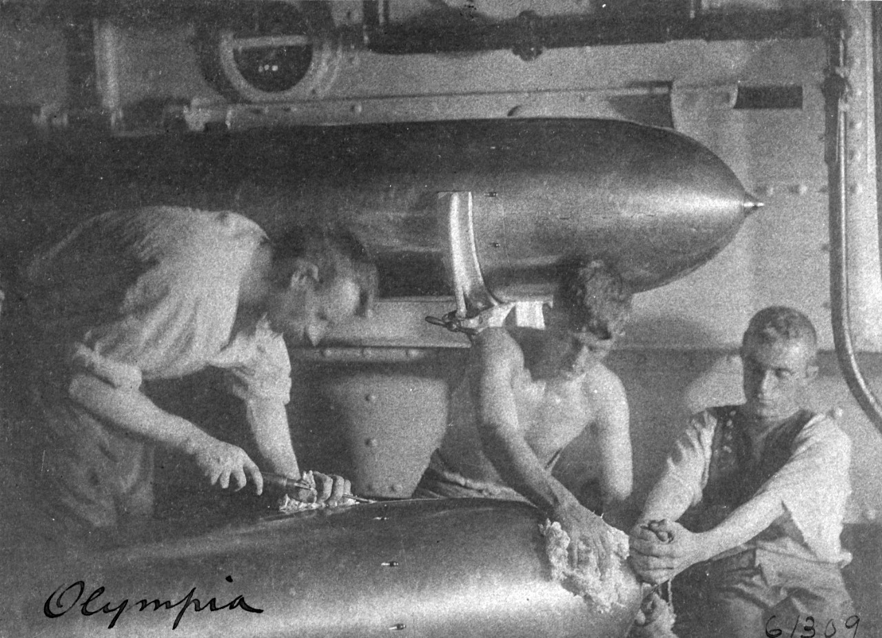 USS OLYMPIA (C-6), torpedo maintenance on board, 1898. 