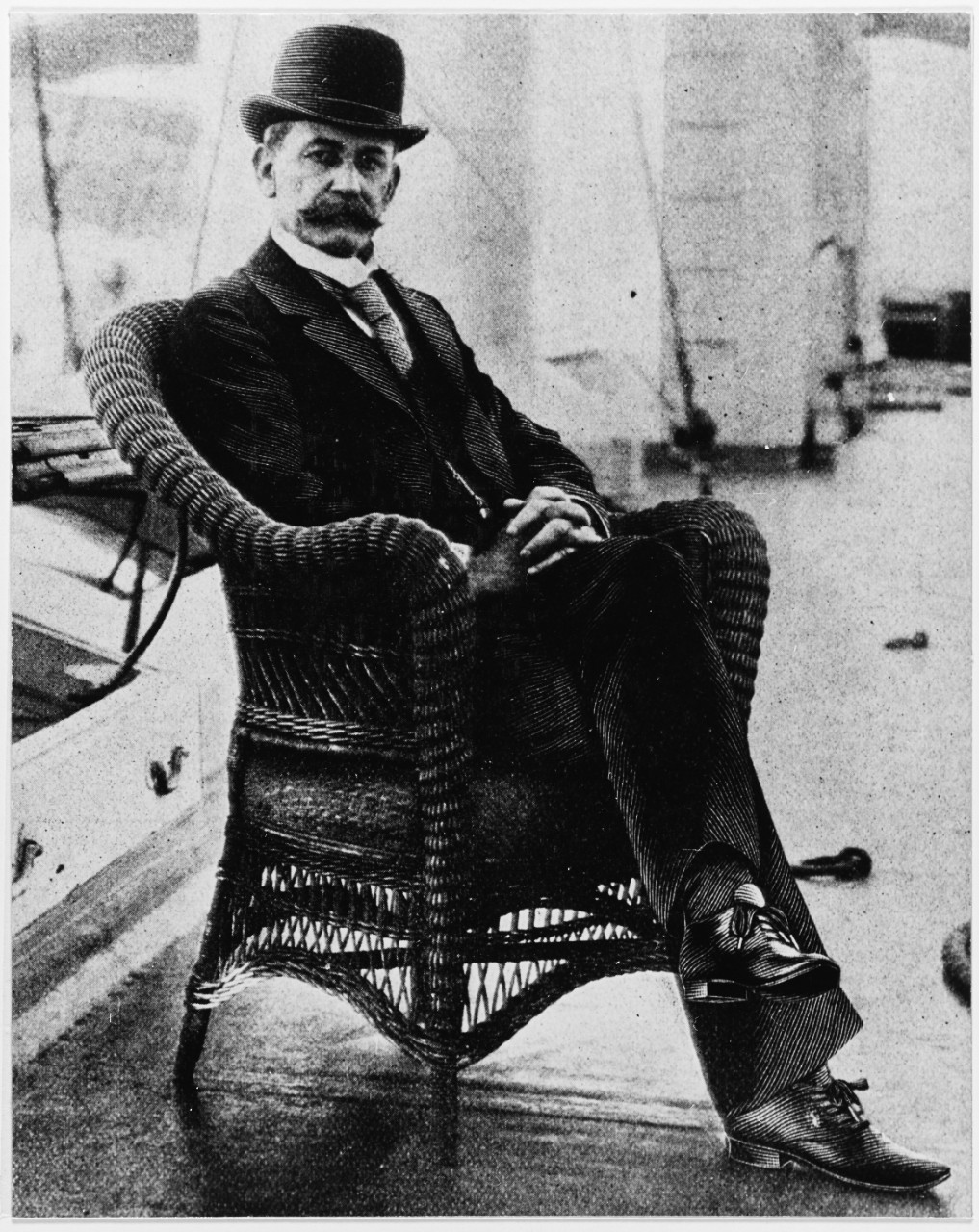 Captain Charles D. Sigsbee, USN, circa 1897, aboard the USS MAINE. 