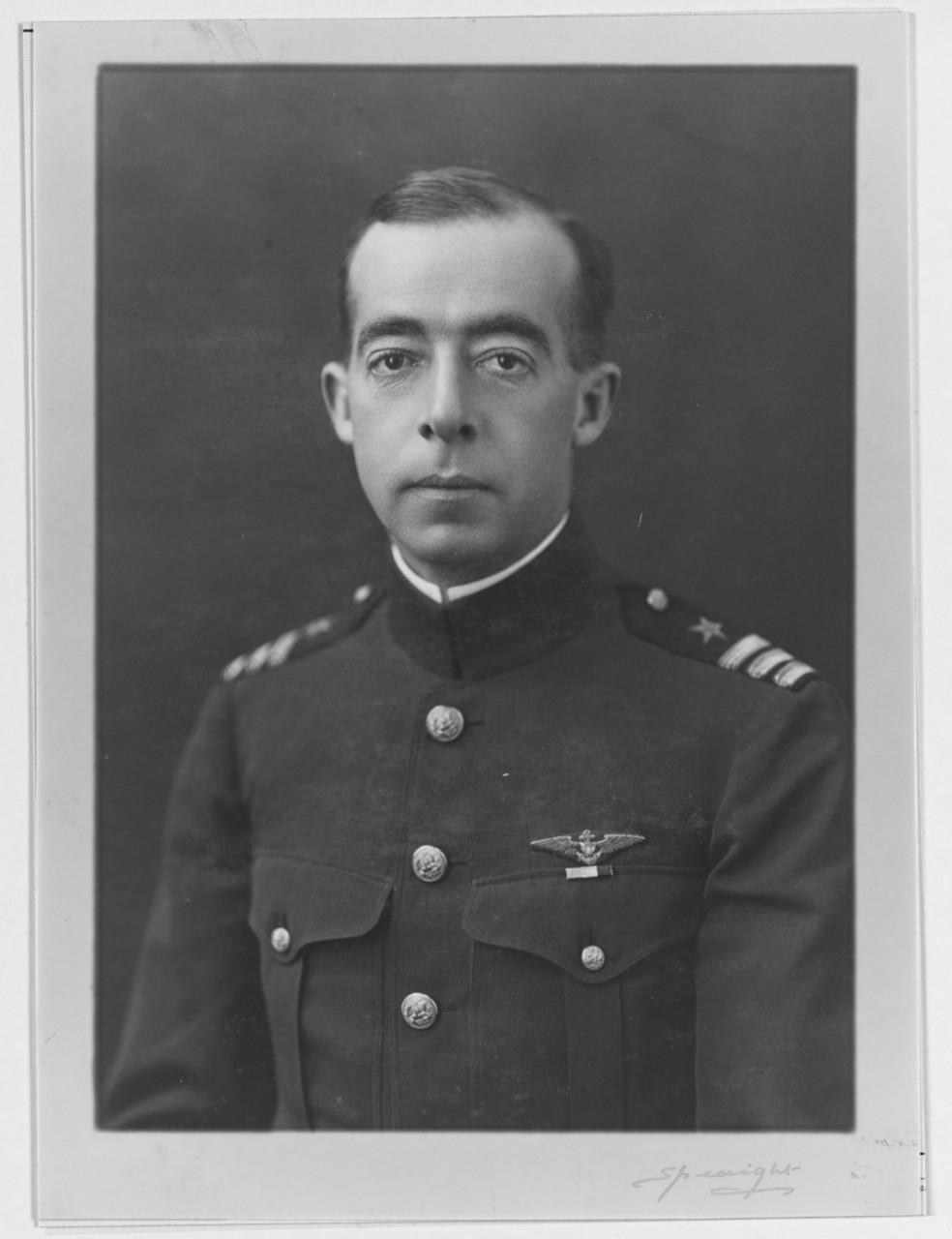 Commander L.H. Maxwell, USN