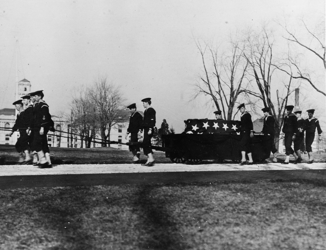 A 26 January 1913 photo by Mrs. C. R. Miller, showing the guard of honor transporting the remains of John Paul Jones to the crypt of the Chapel of the Naval Academy on the Naval Academy grounds.