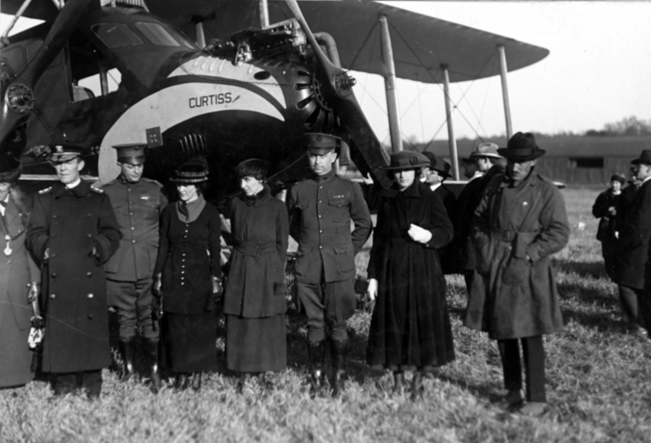 Group with Curtiss Eagle Plane