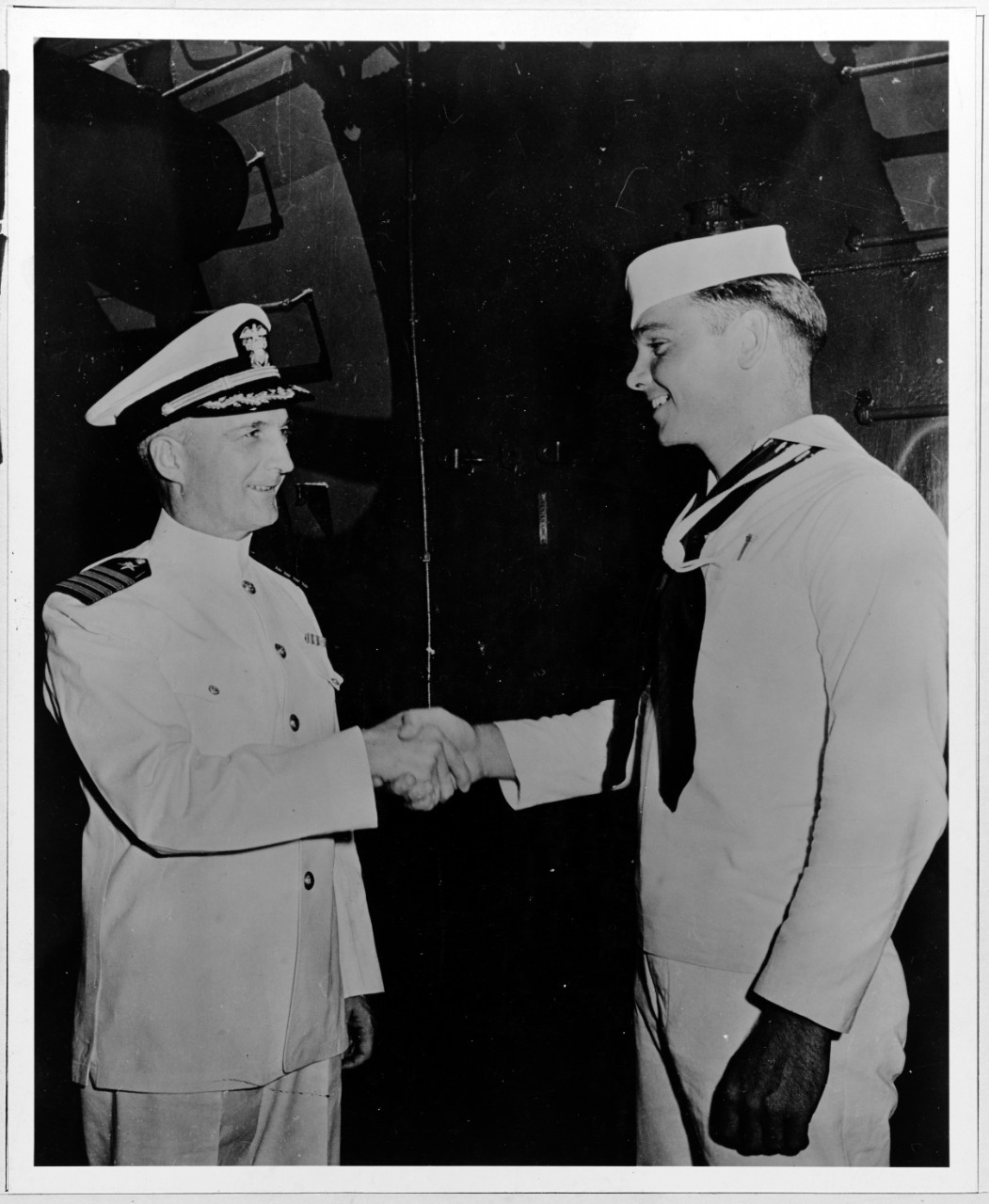 Captain Harold Dodd, USN, Commanding Officer, USS HONOLULU (CL-48)