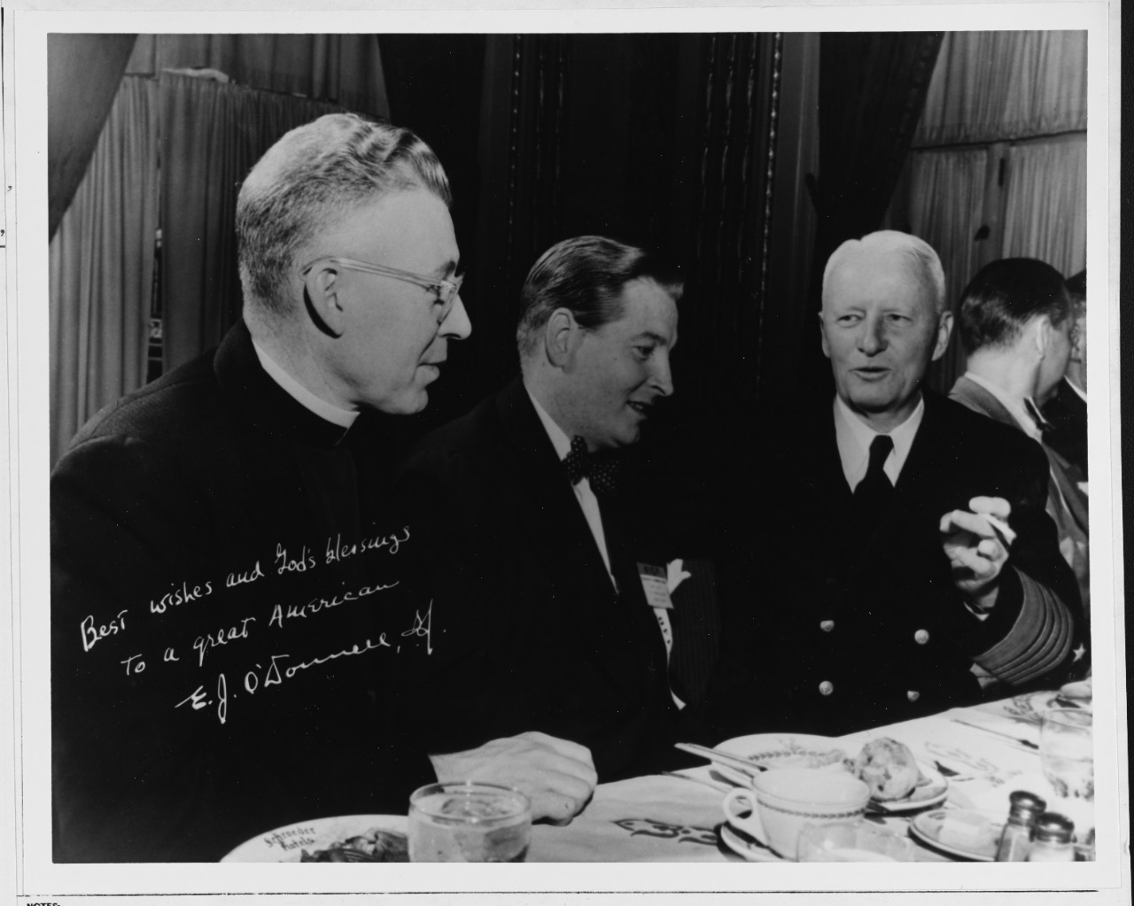 Fleet Admiral Chester W. Nimitz, USN, Chief of Naval operations, attends a banquet in his honor