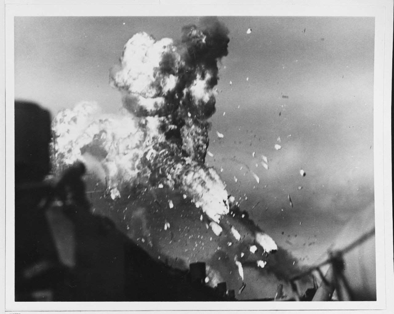Flaming gasoline fumes head skyward over USS INTREPID (CV-11)