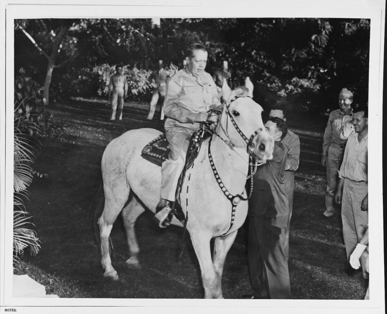 Major General William J. Flood, USAF, sits on the Japanese Emperor's white horse