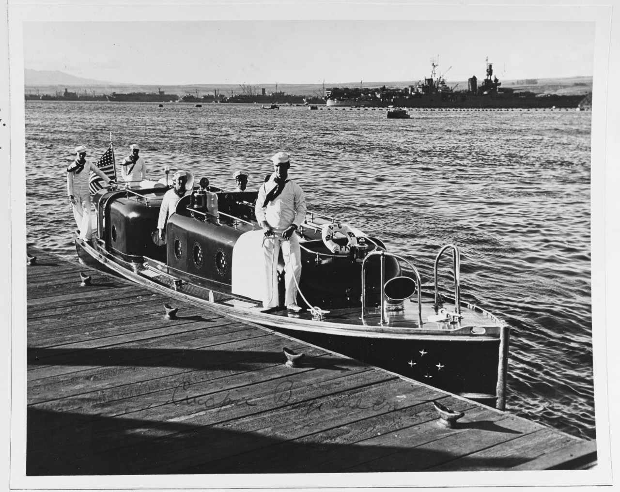 Admiral Chester W. Nimitz's (CinCPac) barge and crew.
