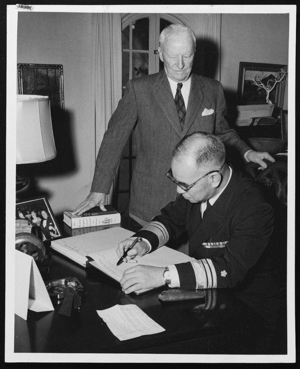 Fleet Admiral C.W. Nimitz with Japanese Visitor