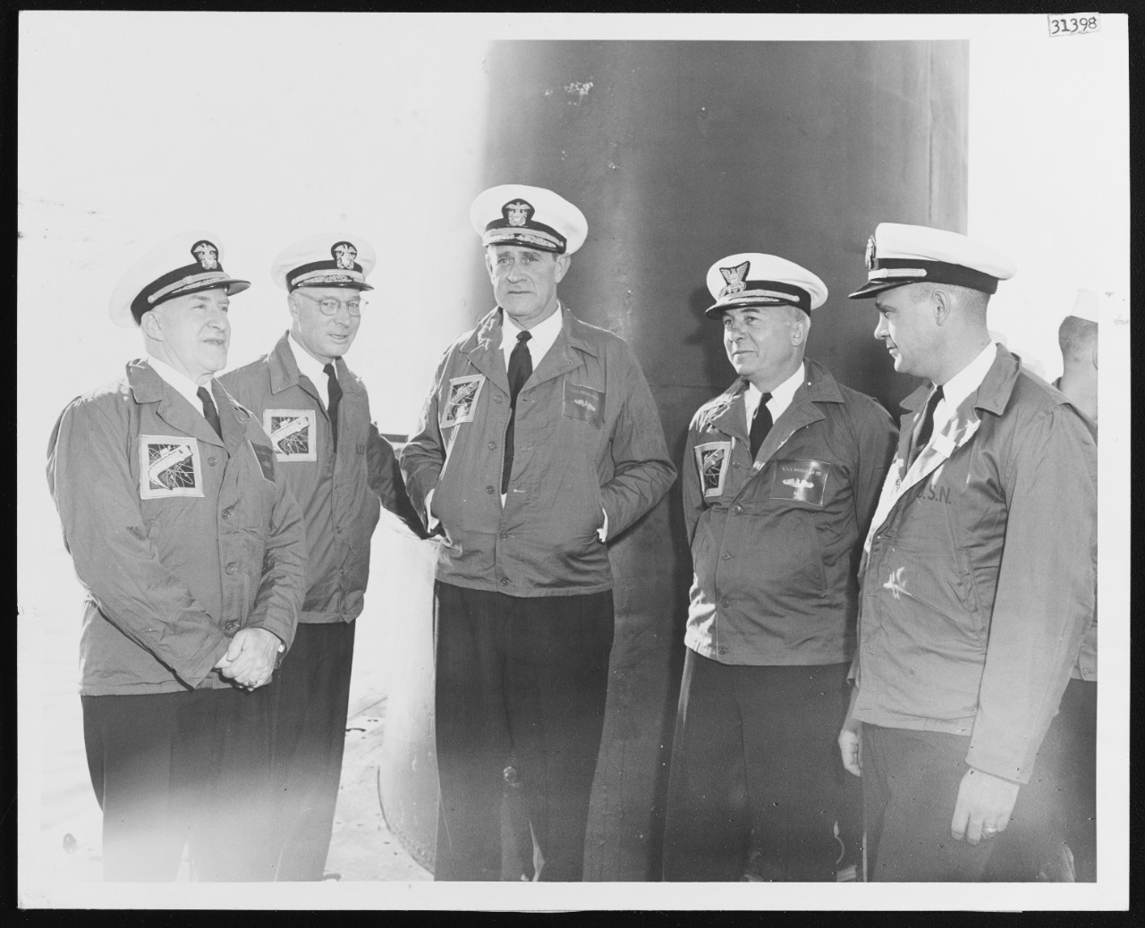 Senior Officers aboard USS NAUTILUS (SSN- 571) during a Visit by Fleet Admiral Nimitz