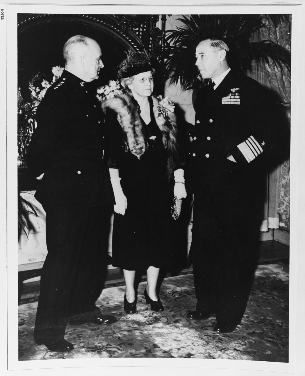 Admiral D.C. Ramsey Chats with General and Mrs. A.A. Vandegrift