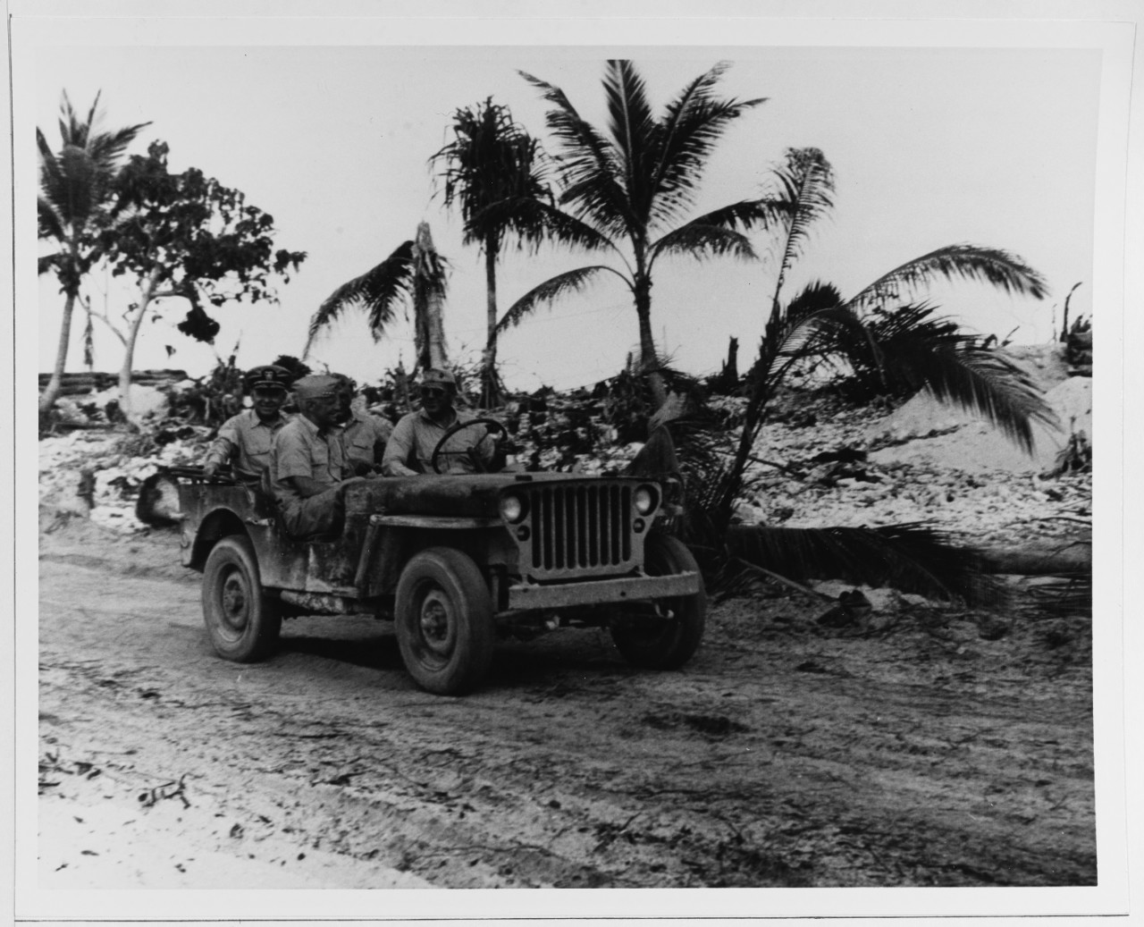 Admiral Chester W. Nimitz, CINCPAC, is Driven Around Tarawa
