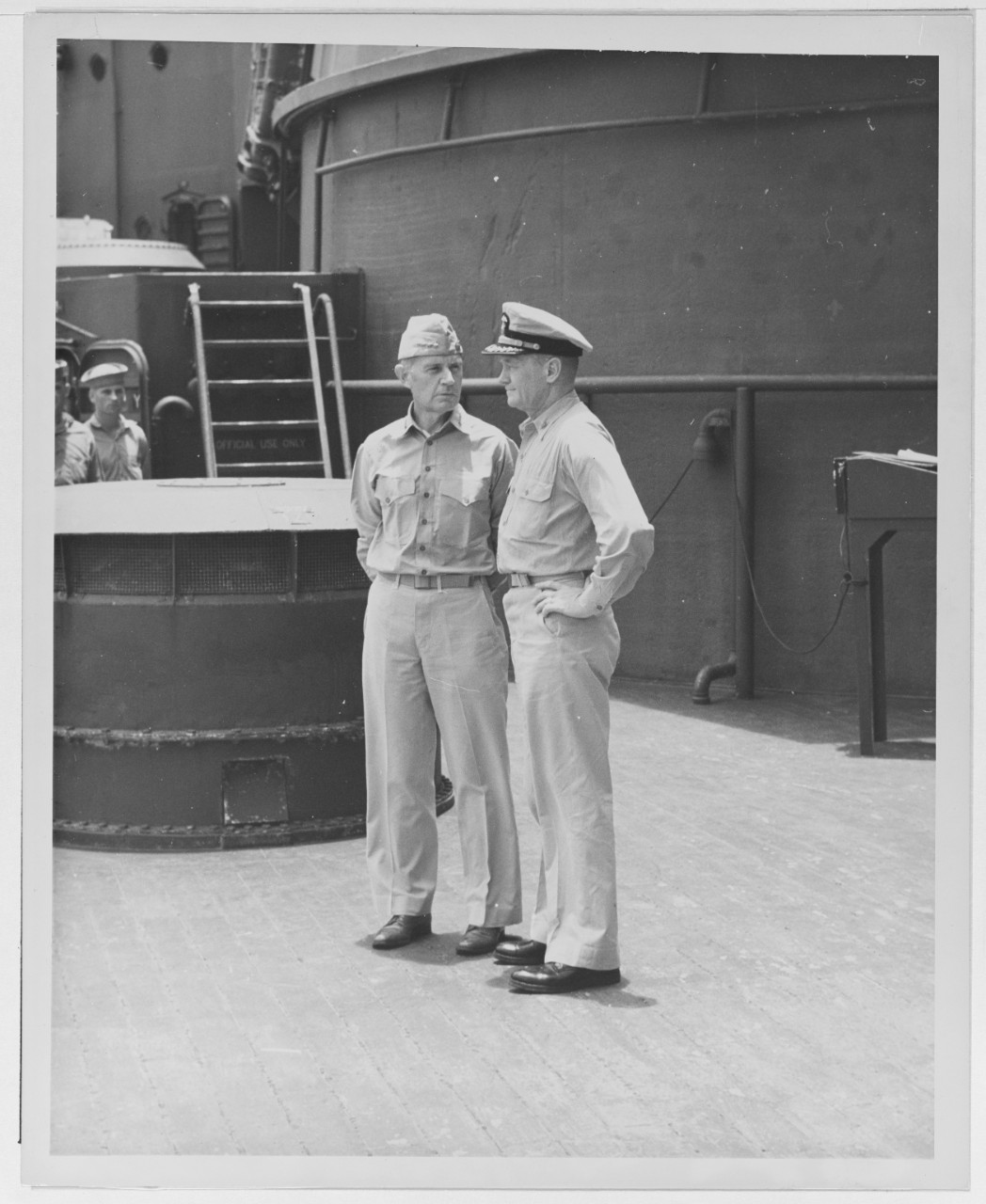 Admiral Raymond A. Spruance, USN, Commander Fifth Fleet, with Captain Carl F. Holden, Commanding Officer of USS NEW JERSEY (BB-62)