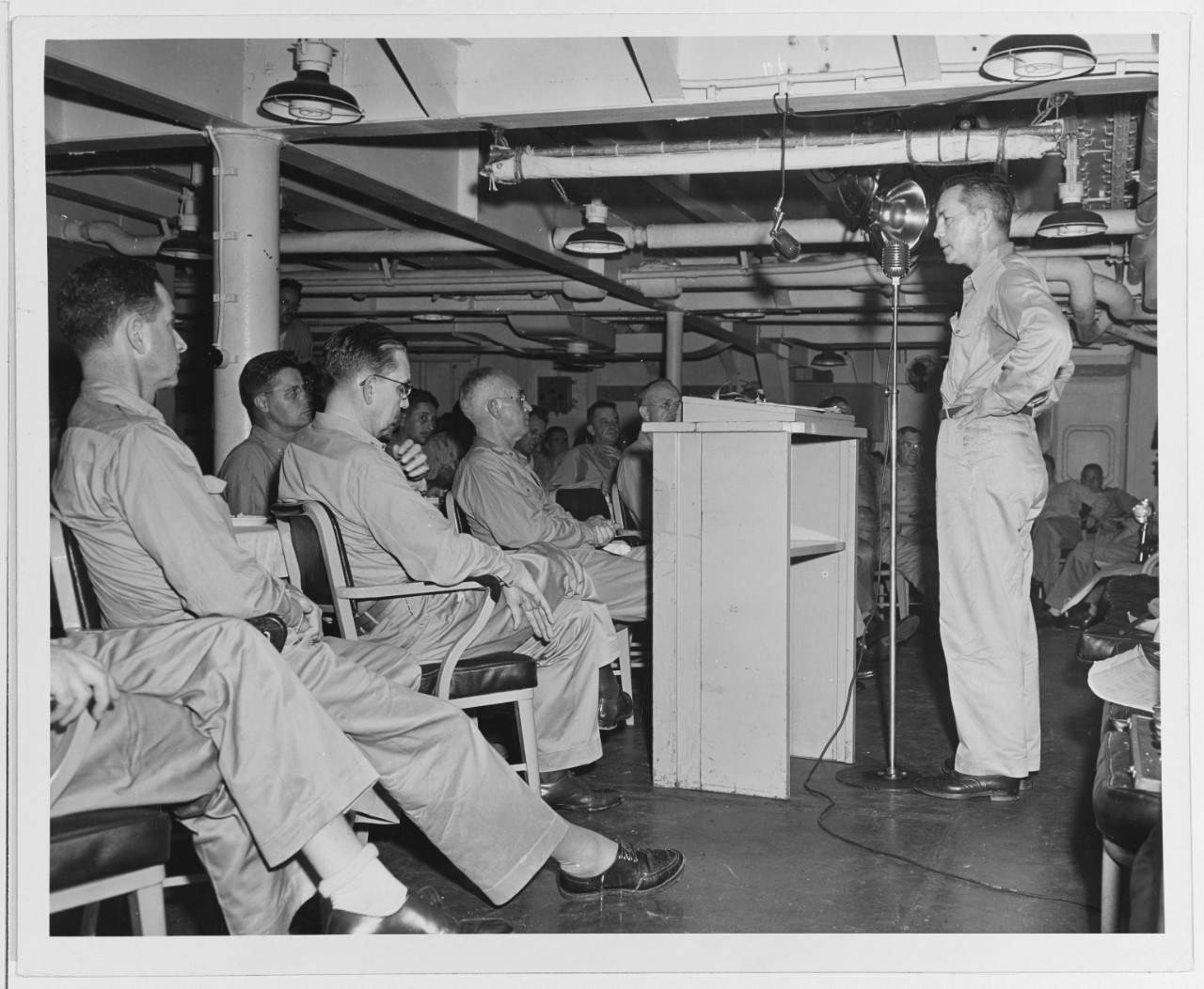 Secretary of the Navy Forrestal Talks to Correspondents and Officers