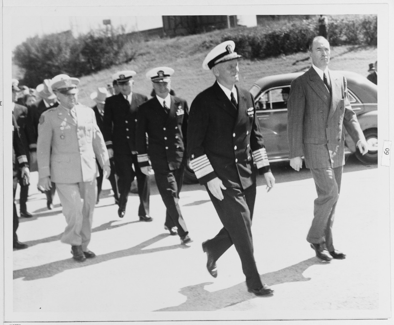Fleet Admiral Nimitz Walks from his Car
