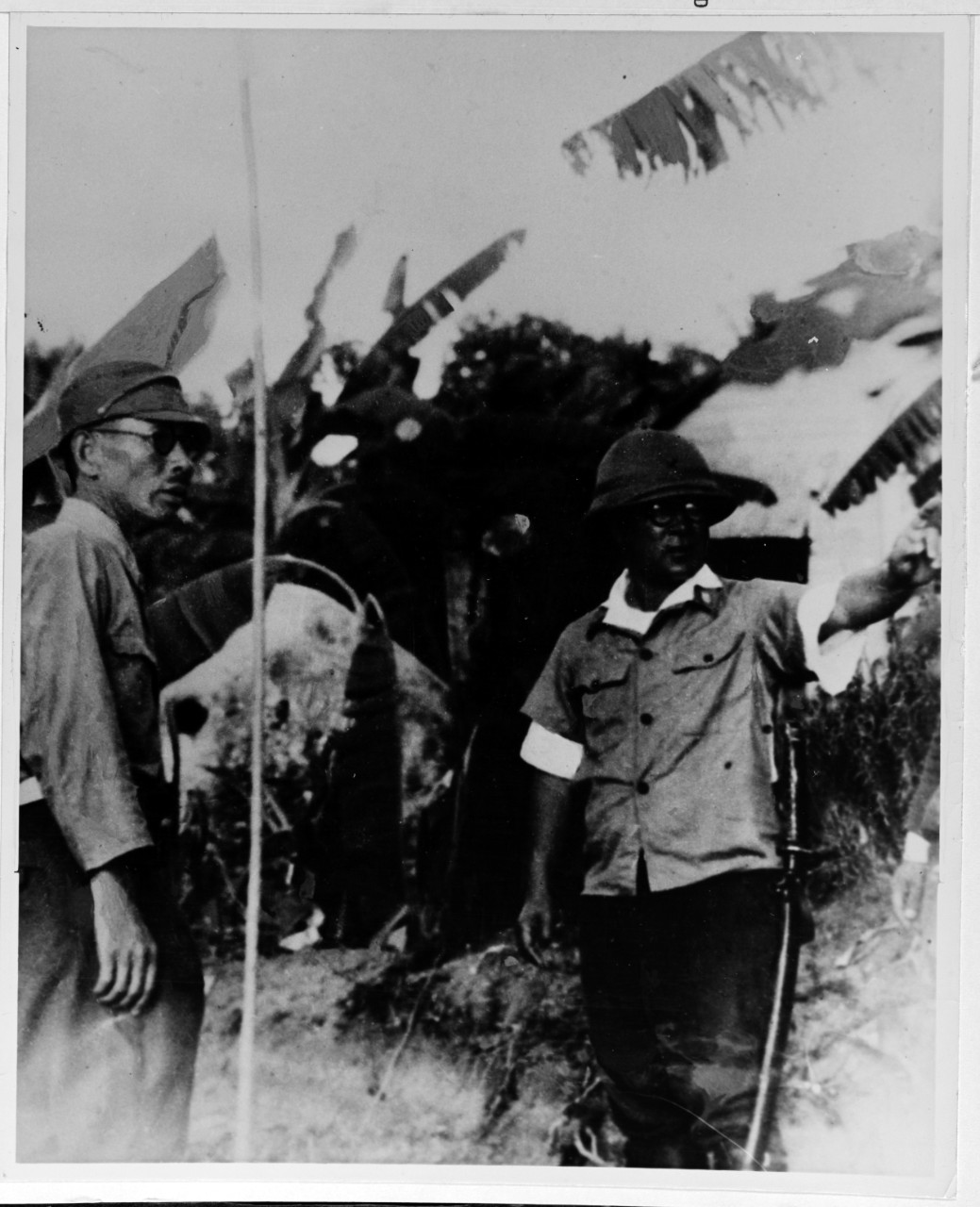 Lieutenant General Takeshi Takashina, IJA, C/O 29th Infantry Division and Southern Marianas Group, and Colonel T. Suenaga, IJA, C/O 38th Infantry Regiment and AGAT Defense Sector on Guam.