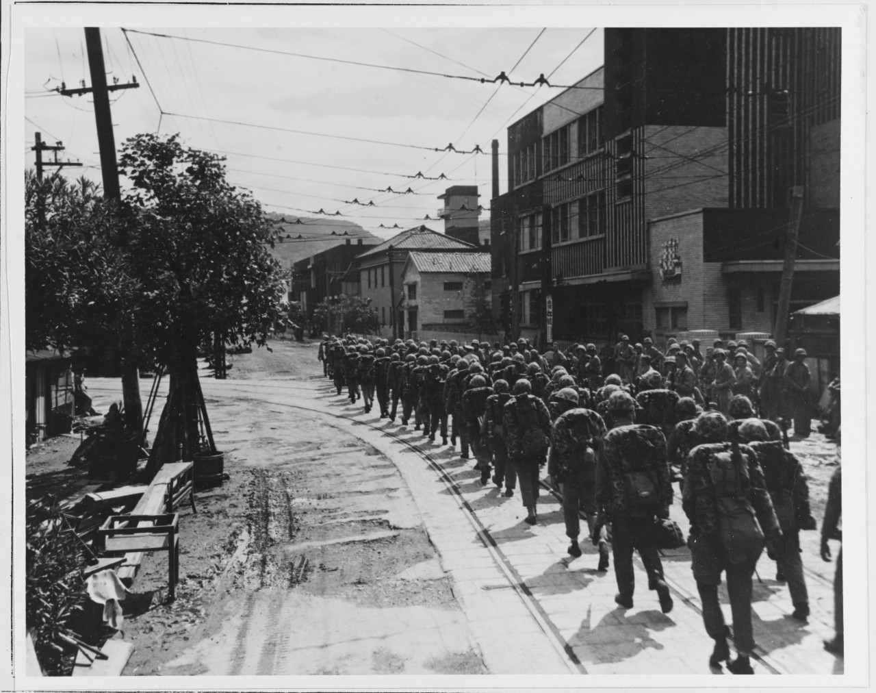 U.S. troops entering Nagasaki, Japan, September 1945.