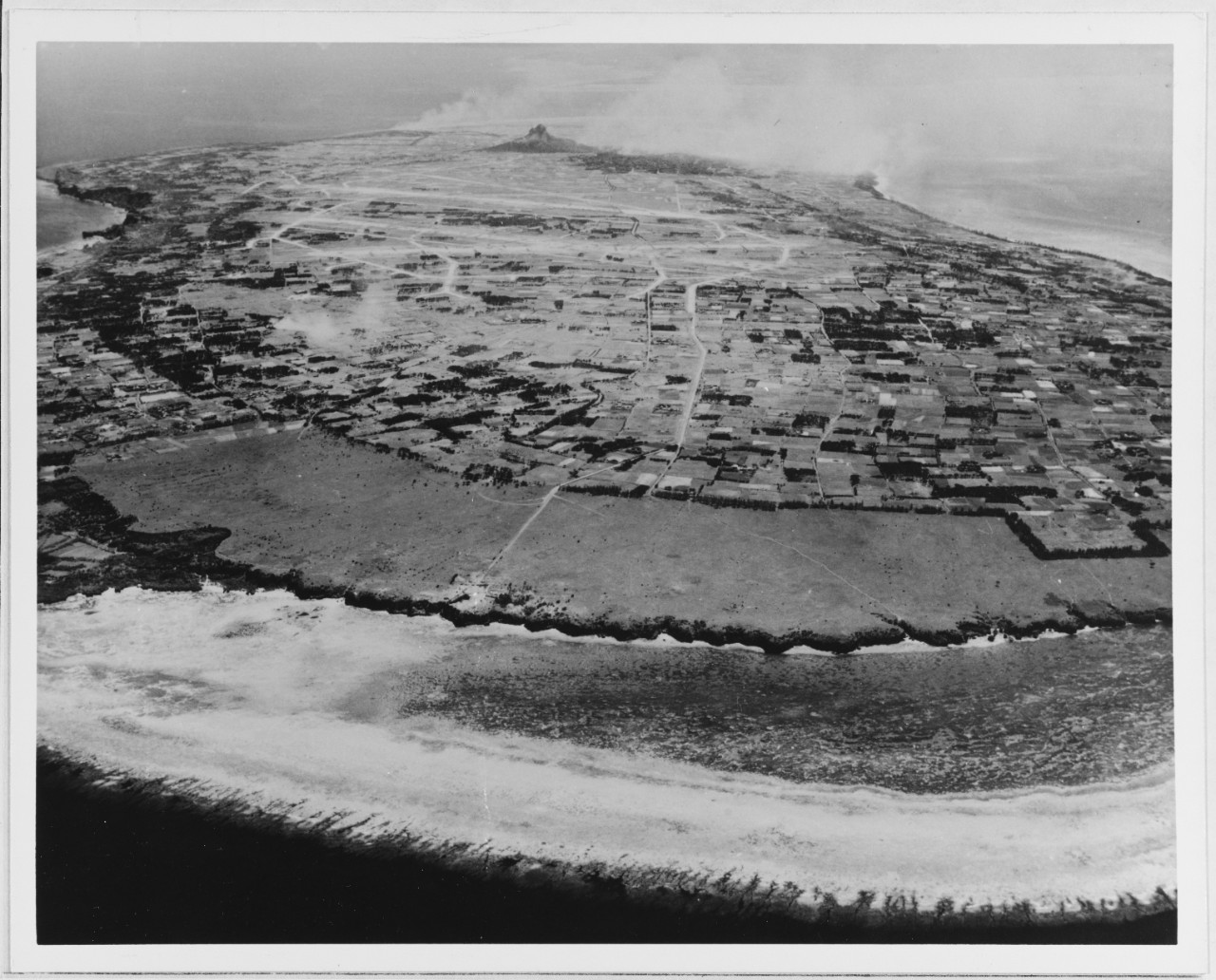 Aerial view of Ie Shima (Iwo Jima) after naval bombardment