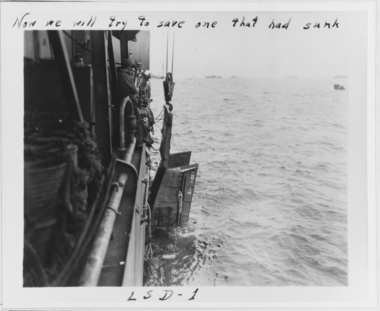 NH 65828 Attempts to salvage LCVP aboard USS ASHLAND (LSD-1)