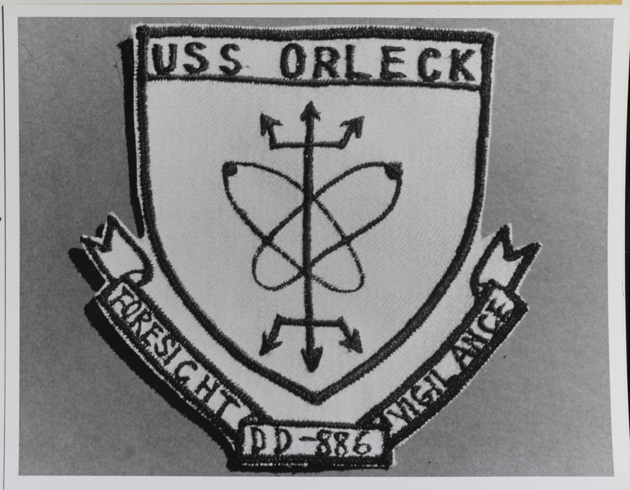 Insignia:  USS ORLECK (DD-886)