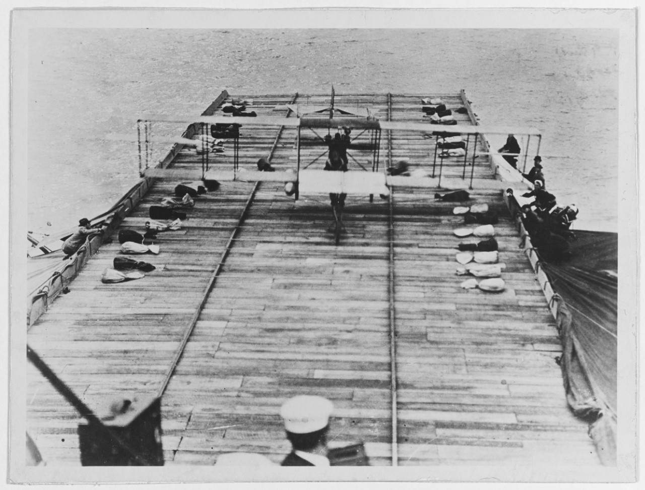 Photo #: NH 77608  First airplane landing on a warship, 18 January 1911