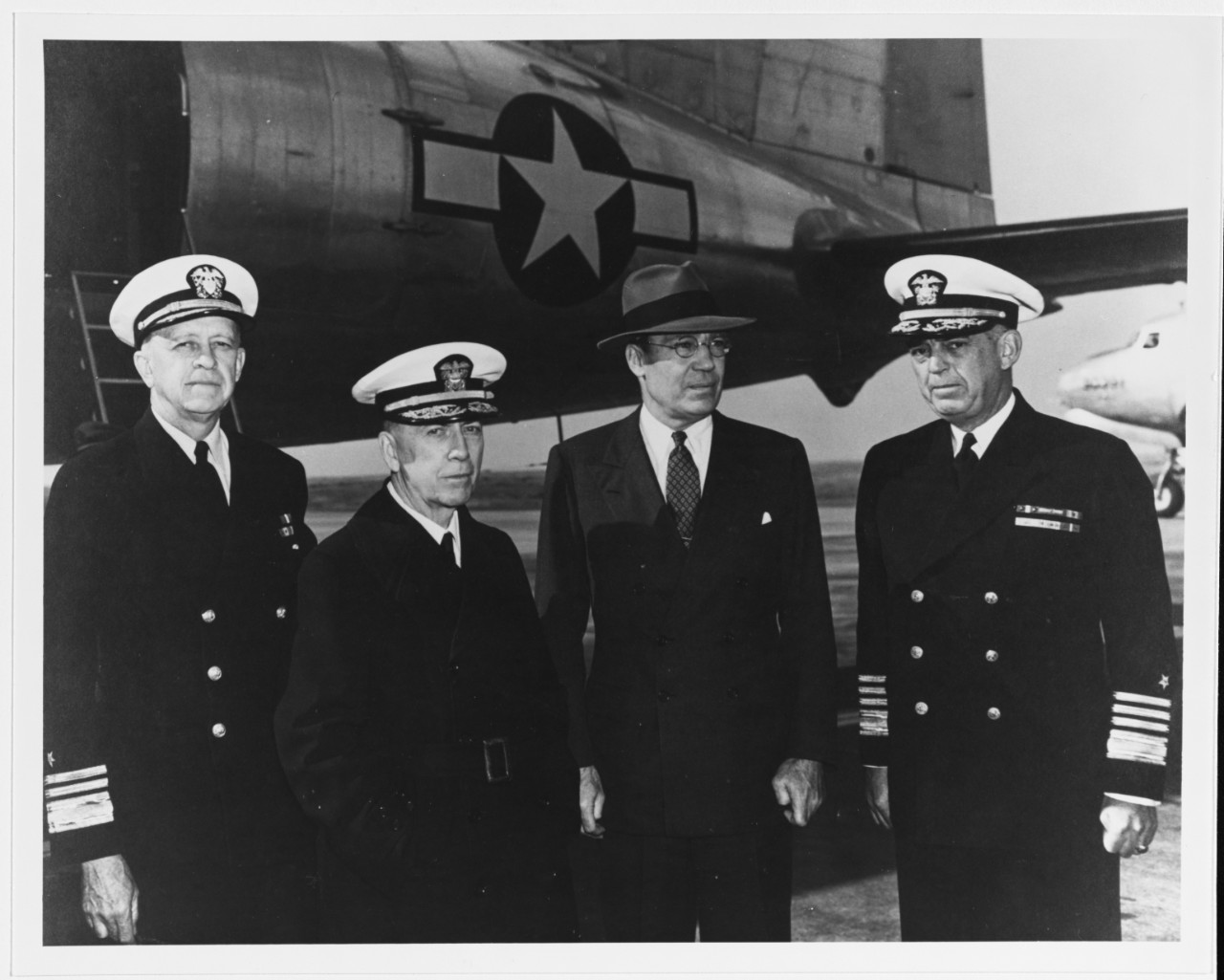 Vice Admiral Russell Willson, Admiral Royal Eason Ingersoll, Honorable Artemas Gates, and Admiral Thomas C. Kincaid