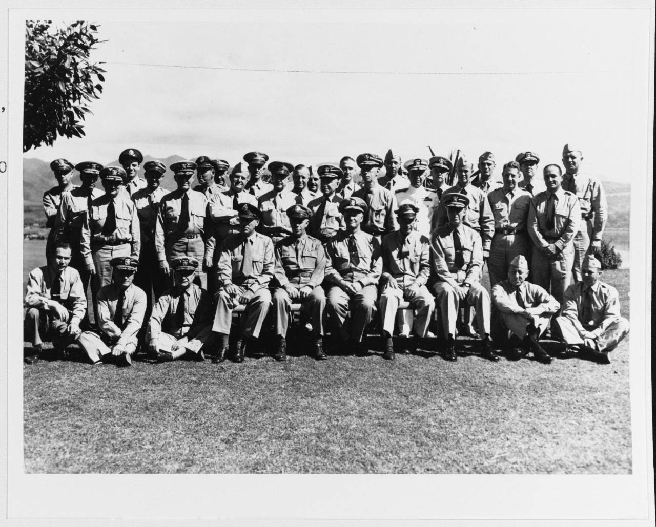 Taken at Pearl Harbor, 1 February, 1944. Some of General McArthur's staff was also in attendance. 