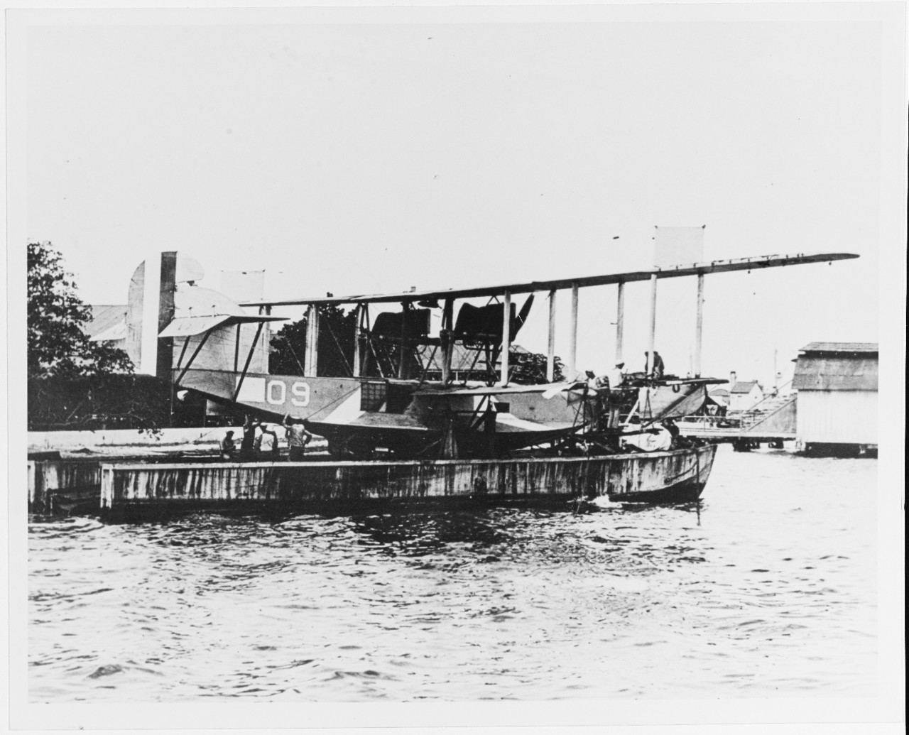 Curtiss F5L on a seaplane barge (YV--a small dry dock for seaplanes), circa 1920-1921.